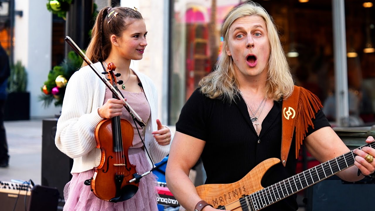 “do-you-know-led-zeppelin’s-whole-lotta-love?”:-over-in-santa-monica,-a-lithuanian-guitarist-and-a-ukrainian-violinist-are-busking-their-way-to-youtube-fame-and-fortune