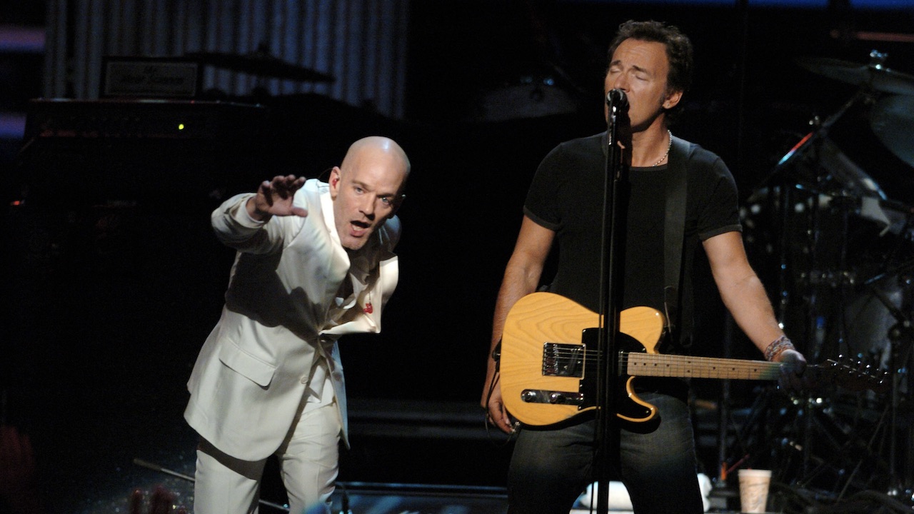 “Michael, come out and sing one with me please.” Watch American icons Bruce Springsteen and Michael Stipe collaborate on a cover of Patti Smith’s Because The Night and perform R.E.M. deep cut Bad Day together back in 2004